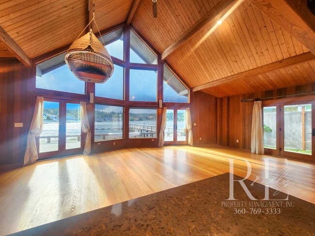 Building Photo - Waterfront Living in Indianola – Dock, Bea...