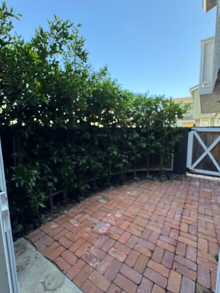 Lovely brick patio off kitchen... - 2220 Curtis Ave