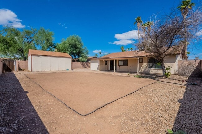 Building Photo - Three bedrooms plus big garage!