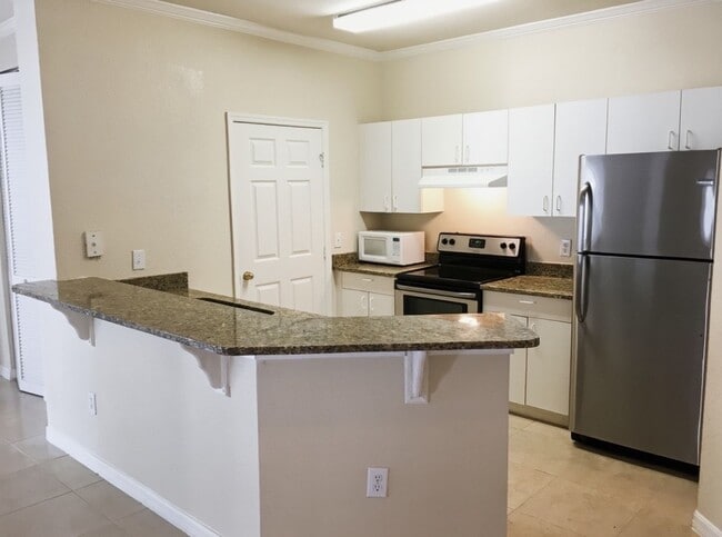 Building Photo - Upgraded 2/2 Condominium in Millenia at Mosaic