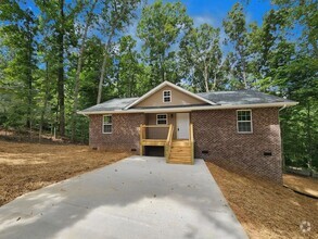 Building Photo - Stunning 3-Bedroom All-Brick Home with New...