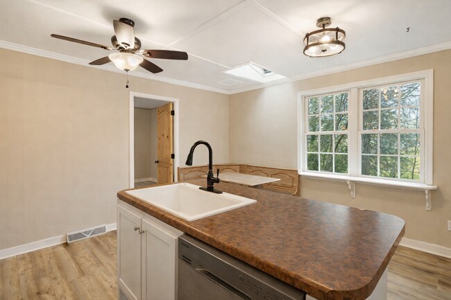 Building Photo - Rural Retreat in Candler with Bonus Room (Heat, Water, & Lawn Maintenance Included)