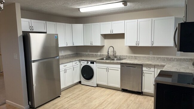 Building Photo - 5983 Harshmanville Rd