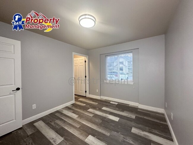 Building Photo - 10042 W Garverdale Ln