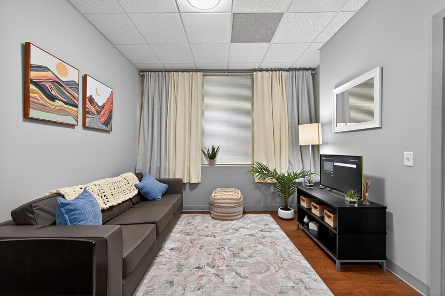 Bright Living Room with Natural Light at University Plaza NIU Off-Campus Apartments - University Plaza Apartments
