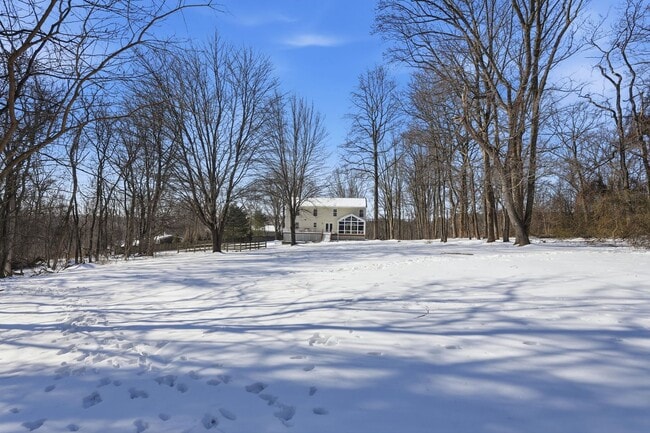 Building Photo - Numerous updates and thoughtful improvements complete this property, making it a rare opportunity...