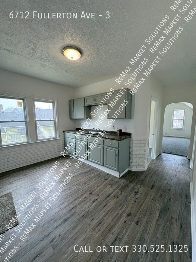 Building Photo - 6712 Fullerton Ave