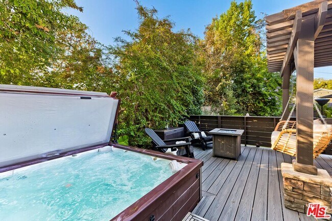 Building Photo - 5721 Tellefson Rd