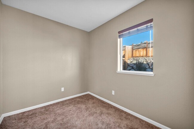 Building Photo - Sun-Filled, Spacious Living with a Three-Car Garage