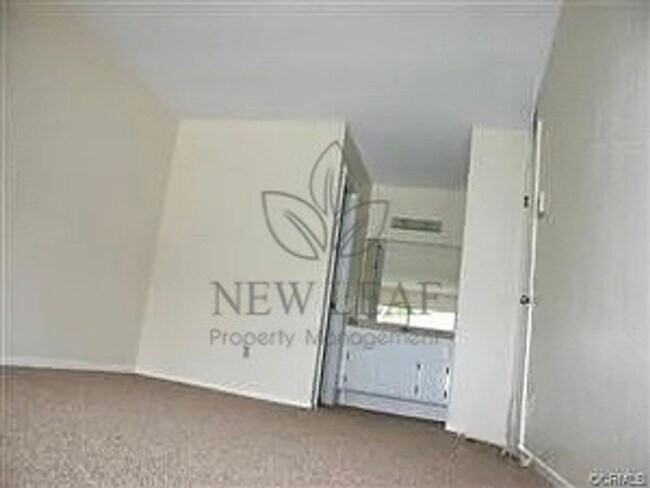 Building Photo - Charming 2-Bedroom Condo in North Pomona – Prime Location!