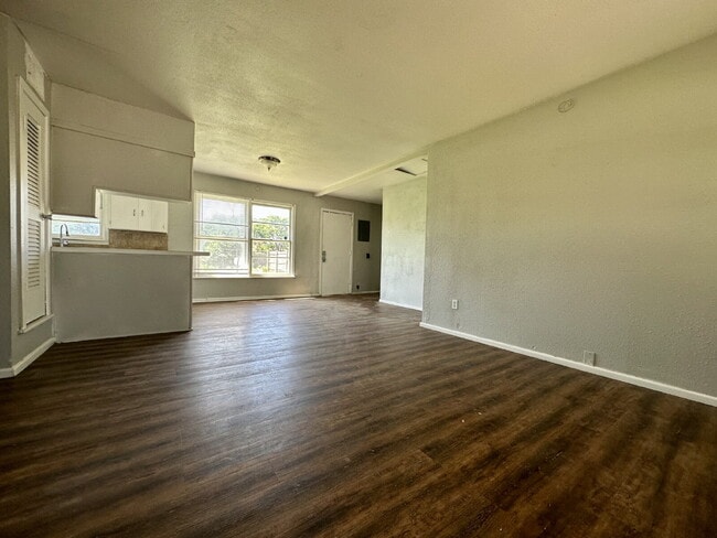 Building Photo - Updated Home with Gorgeous Floors & Large ...