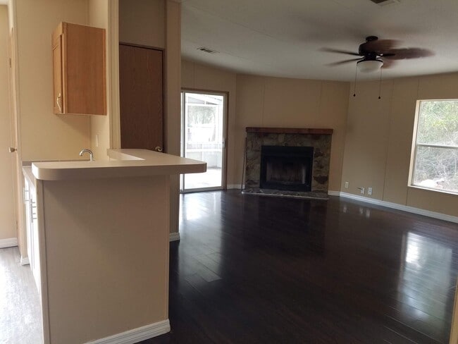 Building Photo - 3 bedroom 2 bath on 1/2 acre of land with a FENCED YARD
