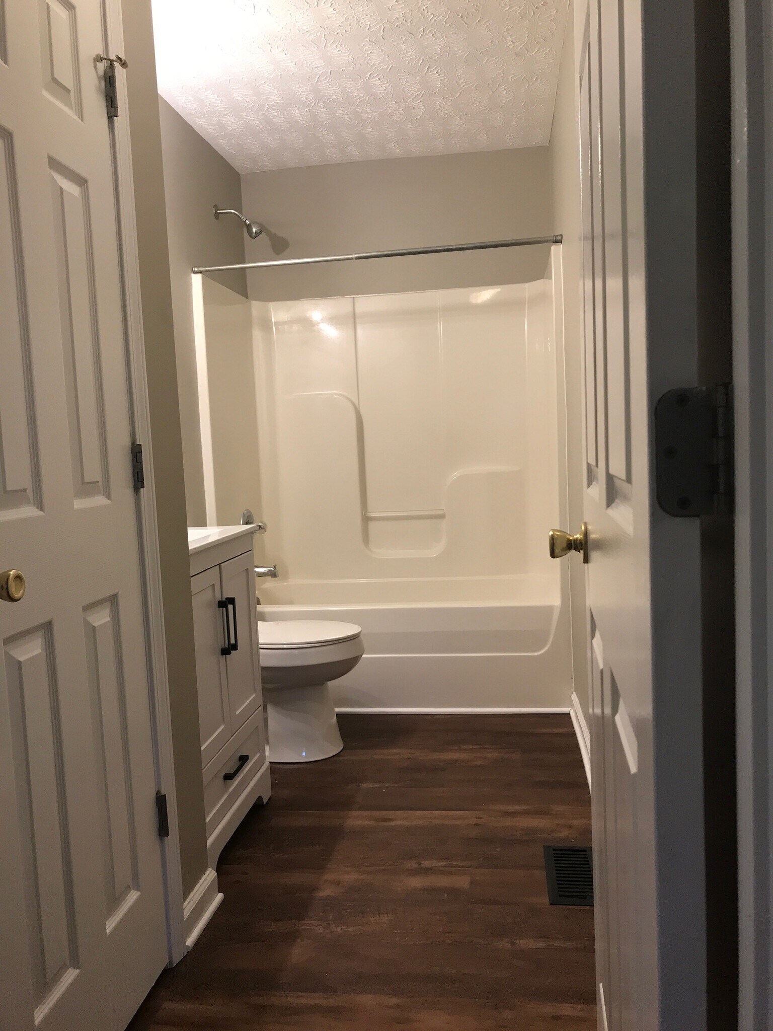 Bathroom with updated sink, lighting and toilet. - 216 Winters St