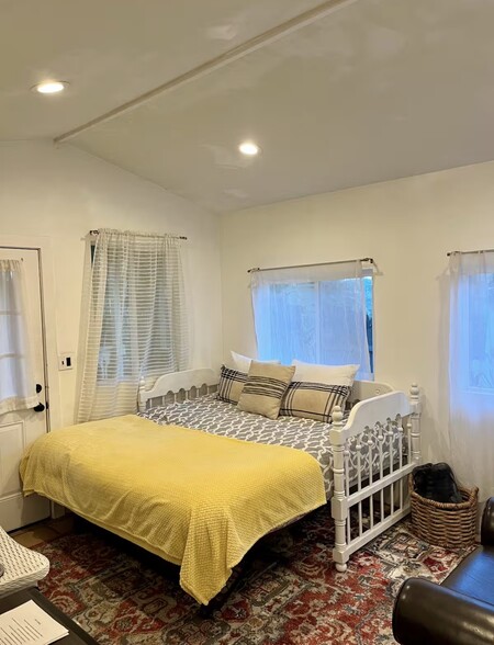 family room with couch converted to bed - 2484 Lillie Ave