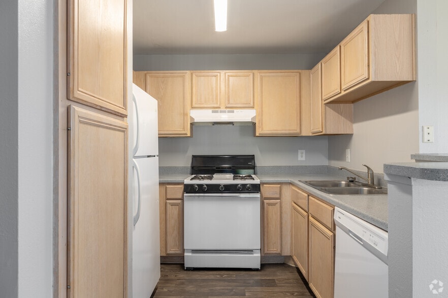 3BR, 2BA Kitchen - Amistad Apartments