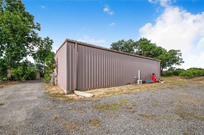 Building Photo - 7740 Lake Hatchineha Rd
