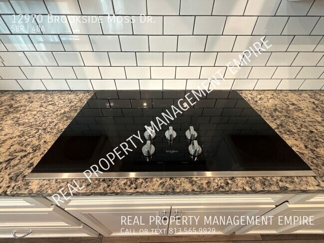 Building Photo - 12970 Brookside Moss Dr