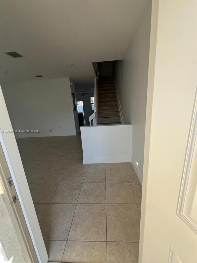 Building Photo - 9399 W 33rd Ln