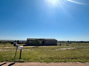 Building Photo - MODERN UPGRADES AND RURAL LIVING IN PEYTON