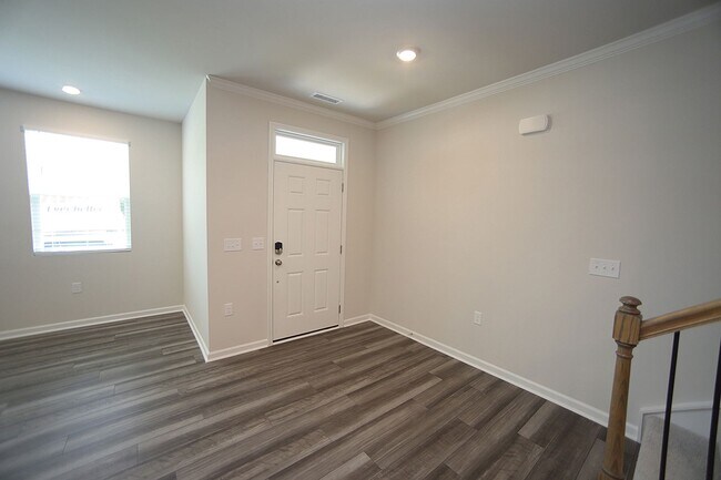 Building Photo - Beautiful 3 Bed+Bonus+2 Car Garage Townhome in New Wake Forest Community