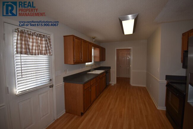 Building Photo - 3BR/2BA south Mboro 2-car garage, fenced backyard with brand new patio!