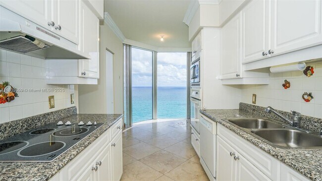 Building Photo - 4779 Collins Ave