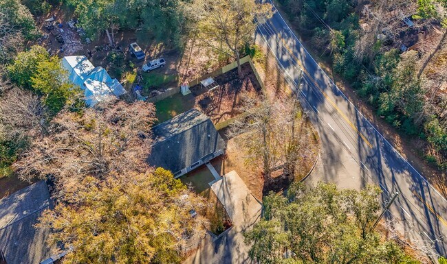 Building Photo - LOVELY & Modern NW 2/1 w/ New Flooring & Huge Privacy Fenced Yard that Inc Lawn Maintenance! Avai...