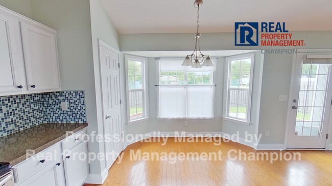 Building Photo - Spacious Home with Fenced Backyard