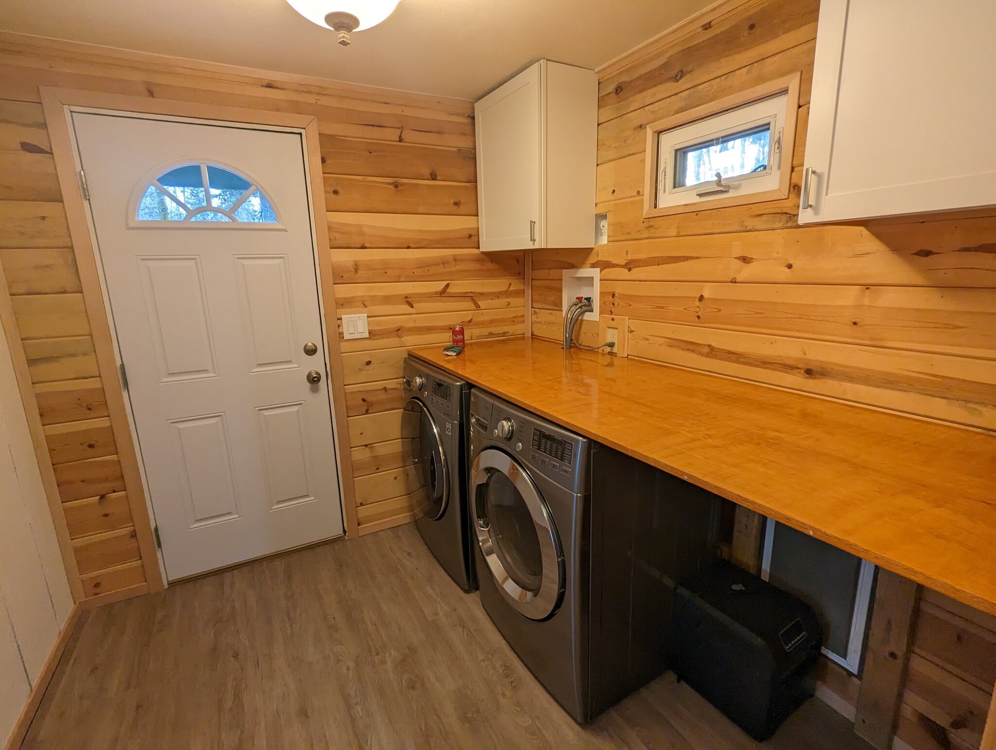 Entryway and laundry room - 23603 W Lake Kayak Dr