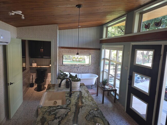 Building Photo - Custom built condo! Country Living! Offered unfurnished OR furnished!