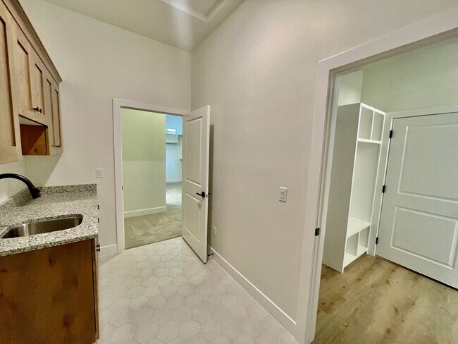 Building Photo - BRAND NEW Three Bedroom Home in Desert Cliffs