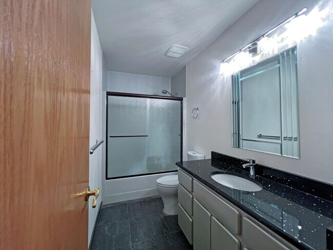 Building Photo - Stunning 4 Bedroom 2.5 Bath with Peek-a-Boo View of Puget Sound