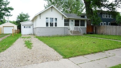 Building Photo - Charming Fully Remodeled Home with 4 Garage Stalls & Park Access in Central Minot