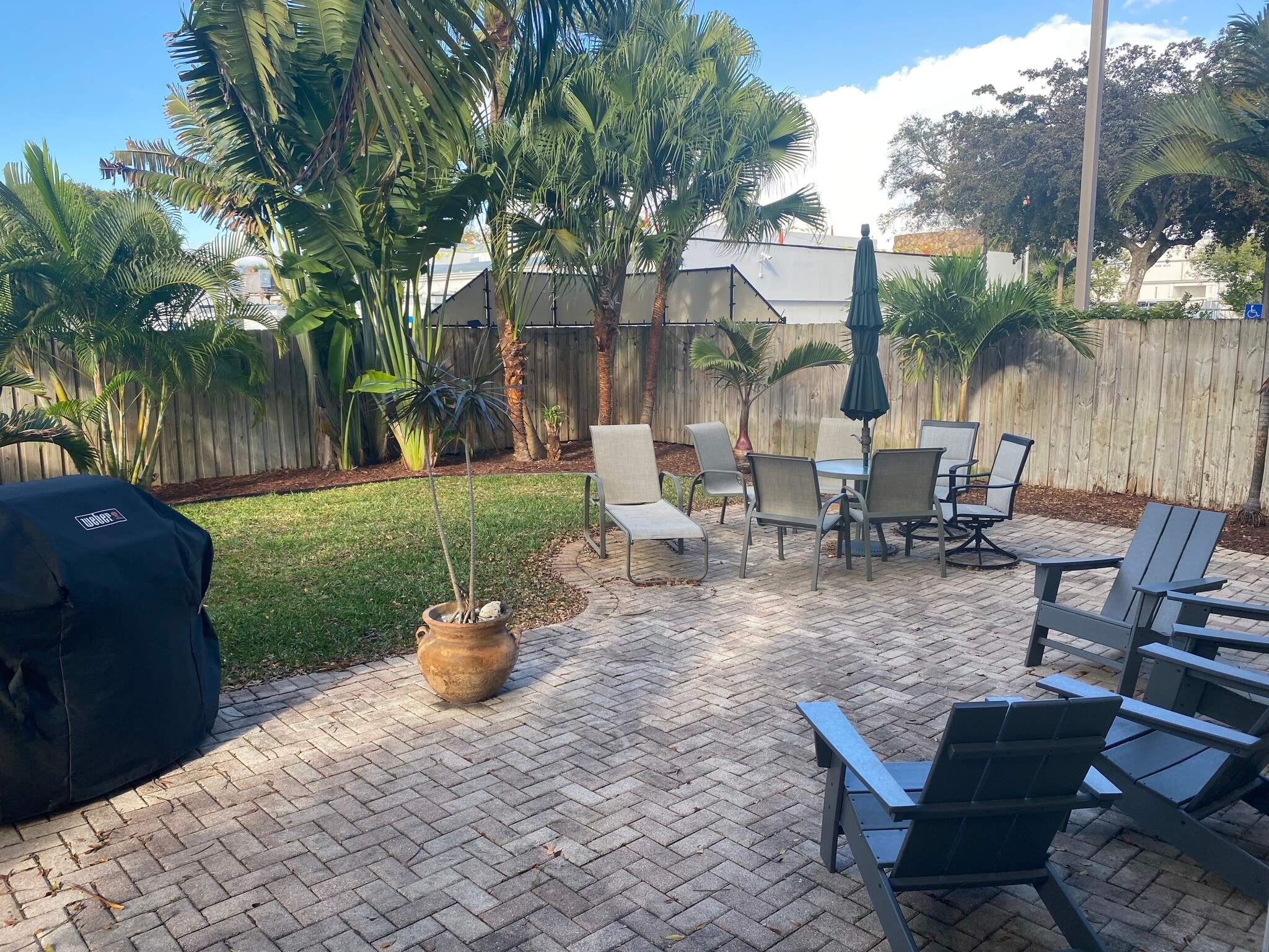 1660 sq. ft. Private, Fenced Backyard with huge patio & grill. Great for Entertaining & for Dogs... - 309 NE 16th St