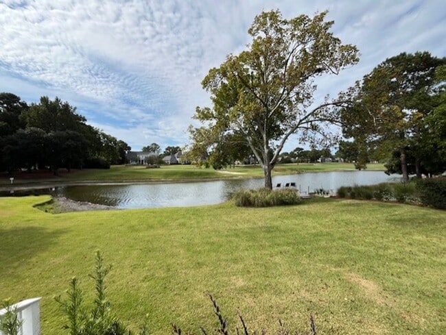 Building Photo - Welcome to Elegant Living in the Charming Porters Neck Plantation Community!