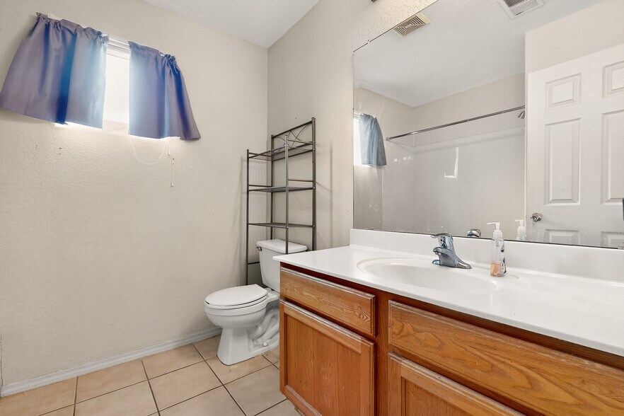 Building Photo - 9000 Violet Orchid Trl SW
