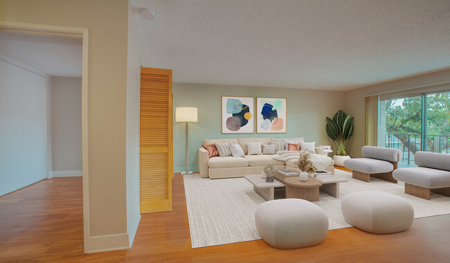 Spacious living room with ample natural light - Villas of Pasadena