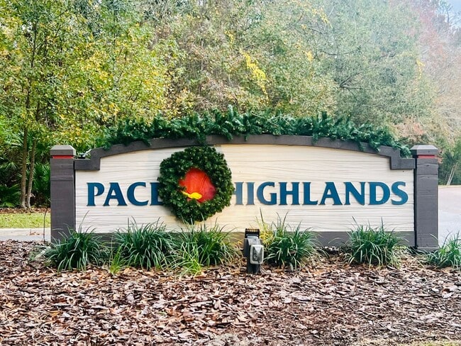 Building Photo - Behind the Gates: A Corner-Lot 4 bedroom, 2 bath Retreat in Coveted Pace Island!!