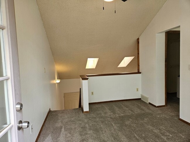 Building Photo - Adorable Loft Style One Bedroom Condo Steps from Buckley AFB