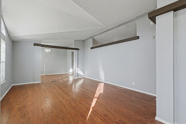 Building Photo - 3-Bed Home with Fireplace, Fenced Yard & Flexible Living Space