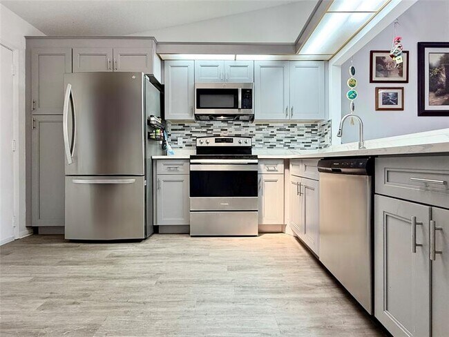Building Photo - 10952 Roebelini Palm Ct