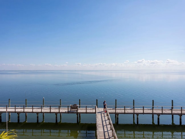 Building Photo - Stunning 2/1 available now at Waterside at Coqunia Key!