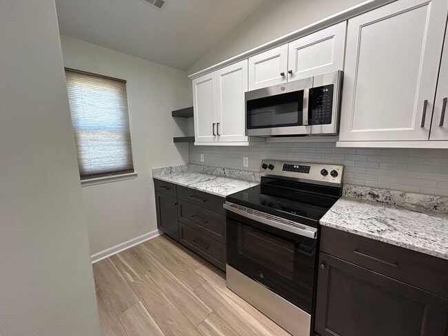 Building Photo - 2 Bed, 2 Bath Renovated Townhouse – Single-Level Living – $1,775/month