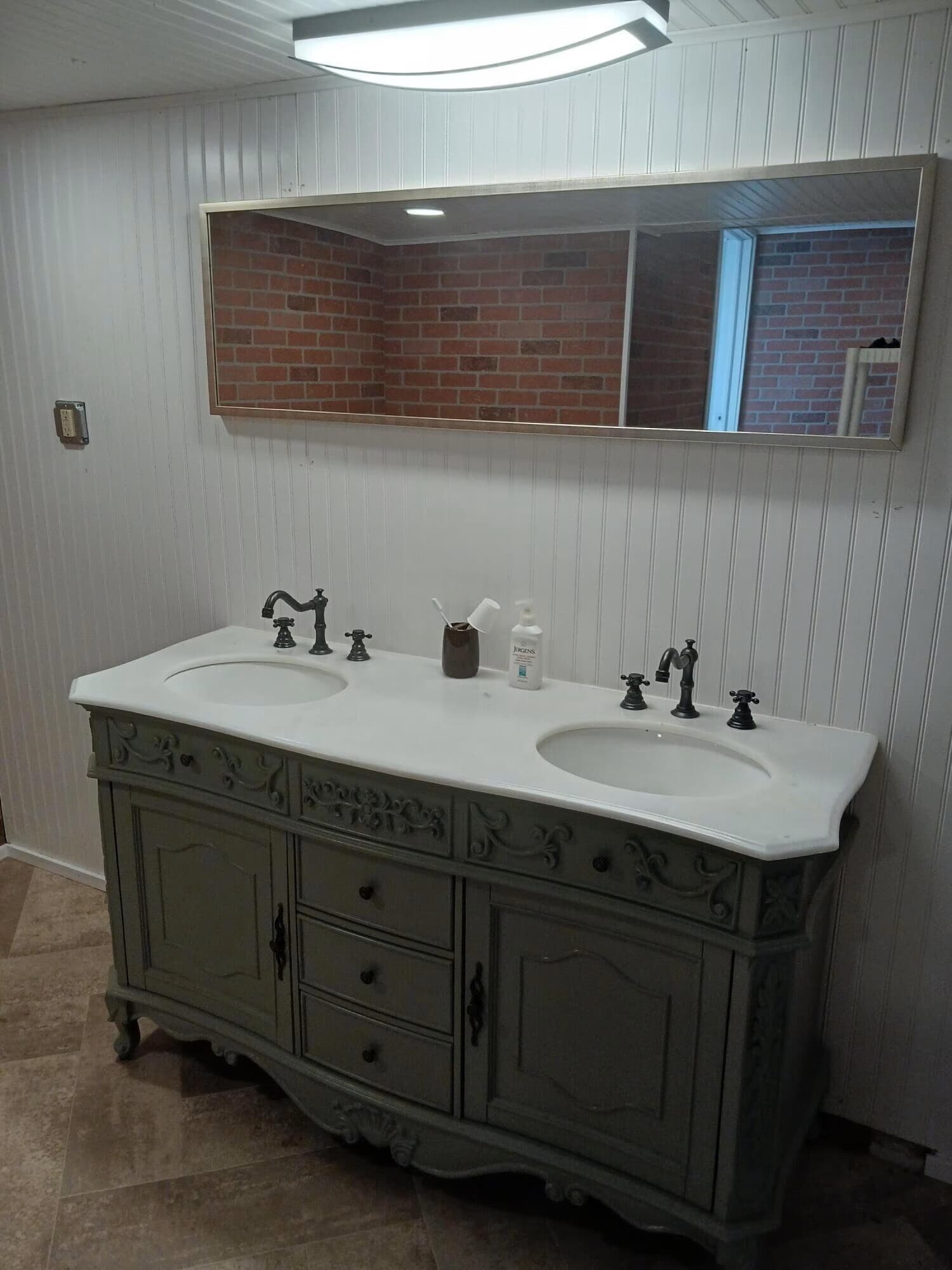 Lower level bathroom with duel-sinks! - 814 Atchison Ave