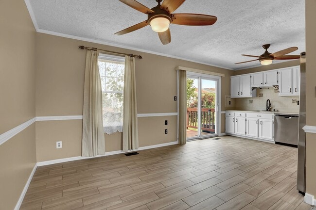 Building Photo - Spacious 4-Level Home with Deck, Workshop ...