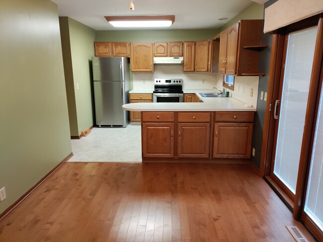 Dining room and kitchen - 13935 Arbor Cir