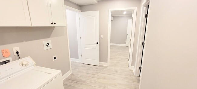 Building Photo - Stylish Basement Rental with Private Ameni...