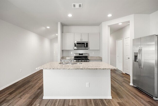 Building Photo - 5808 Begonia Ct
