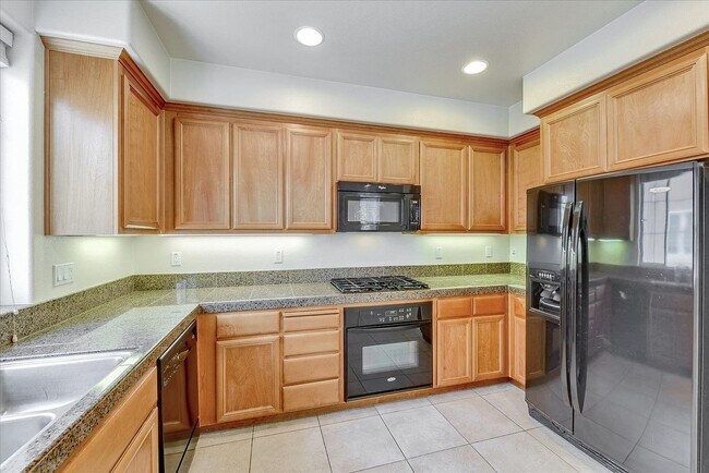 Building Photo - PRIME CORNER HOME NEAR TRAILS LIGHT-FILLED...
