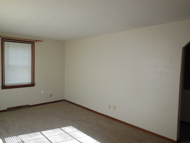 Building Photo - Two Bedroom House with Drive Under Garage!